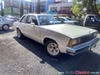 1981 Chevrolet Malibú landau con placas de auto antiguo Fastback
