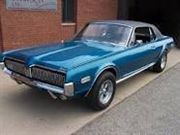 estoy buscando un automovil Mustang 1969...