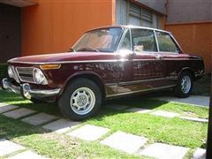 BMW 1972 2002 y Porsche 911 targa 1974.